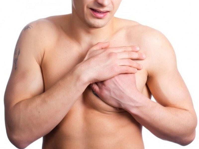 Почему у мужчин большие груди. Молочные железы у мужчин. Боль сосок молочной железы у мужчин.