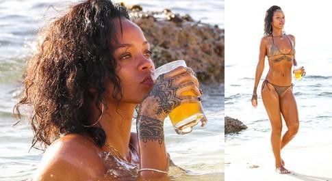 Rihanna bir qədəh şərabla dəniz kənarında