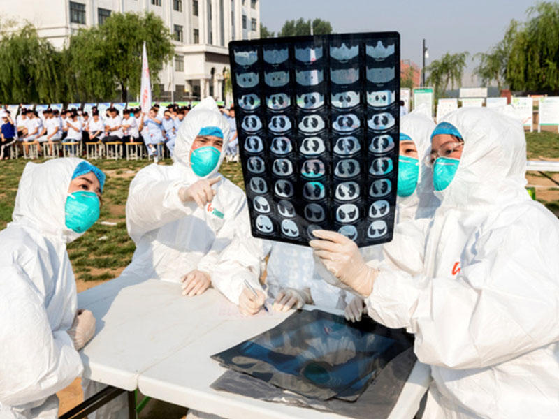Həkimlər Çində epidemiyaya səbəb olan naməlum virusu tapıb