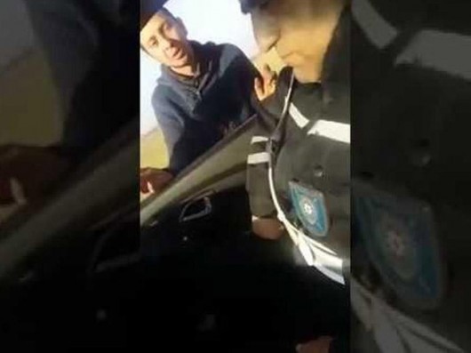 Sürücünün yalvarışlarını videoya çəkən yol polisi İŞDƏN QOVULDU